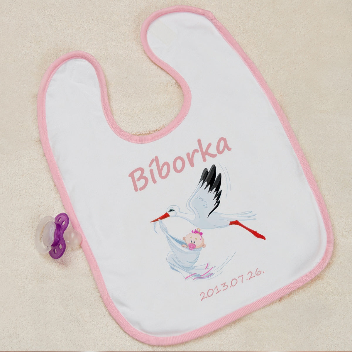 Bébi előke gólyával - kislány