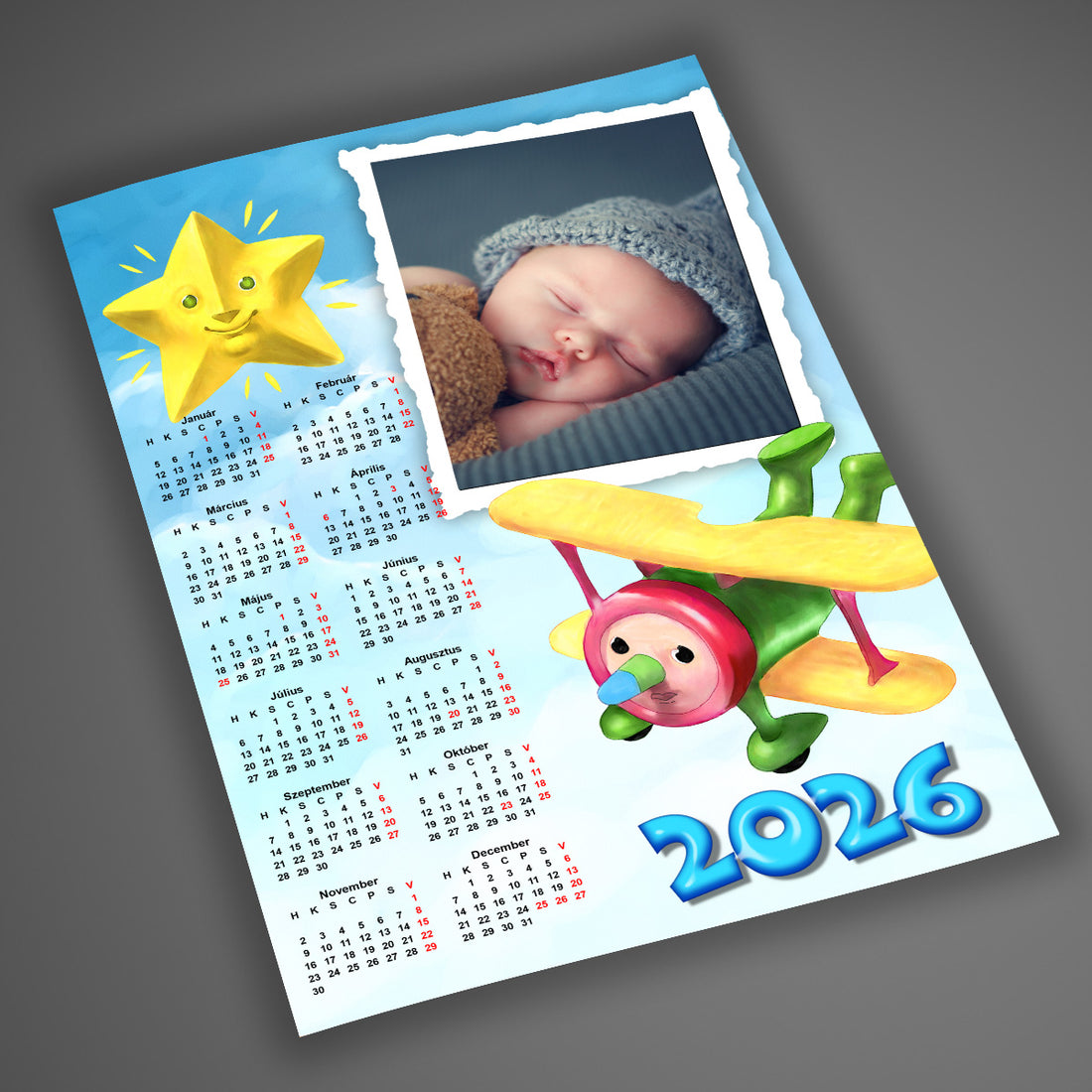 Egyedi 2026-os babás falinaptár repülős grafikával és cserélhető fényképpel – személyre szabható ajándék